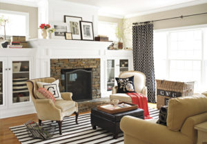 Living room with a fireplace and a big window
