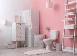 Toilet bowl in modern bathroom interior