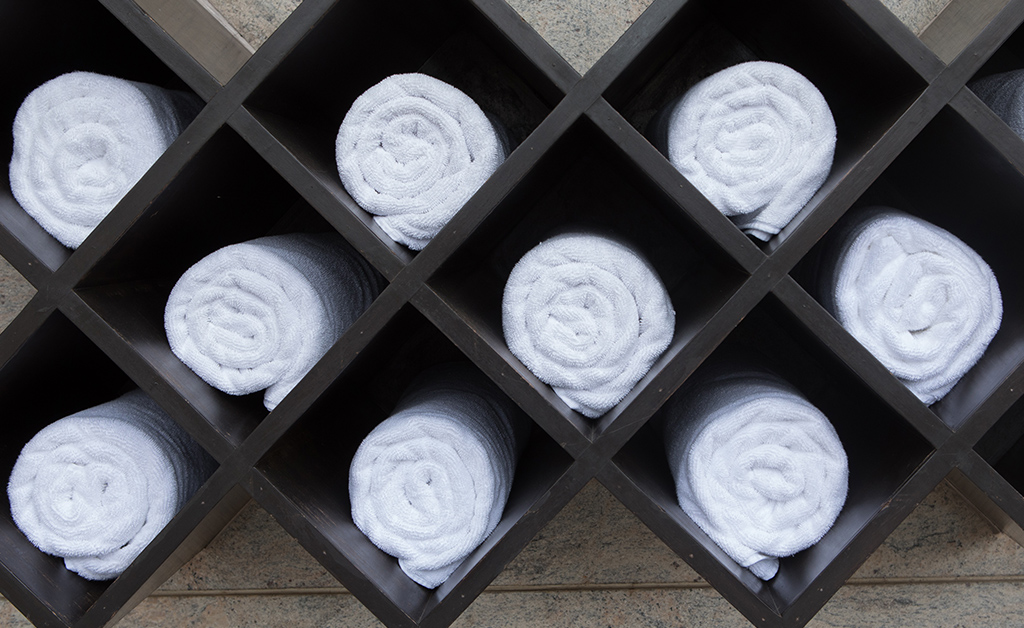 wine rack storing towels