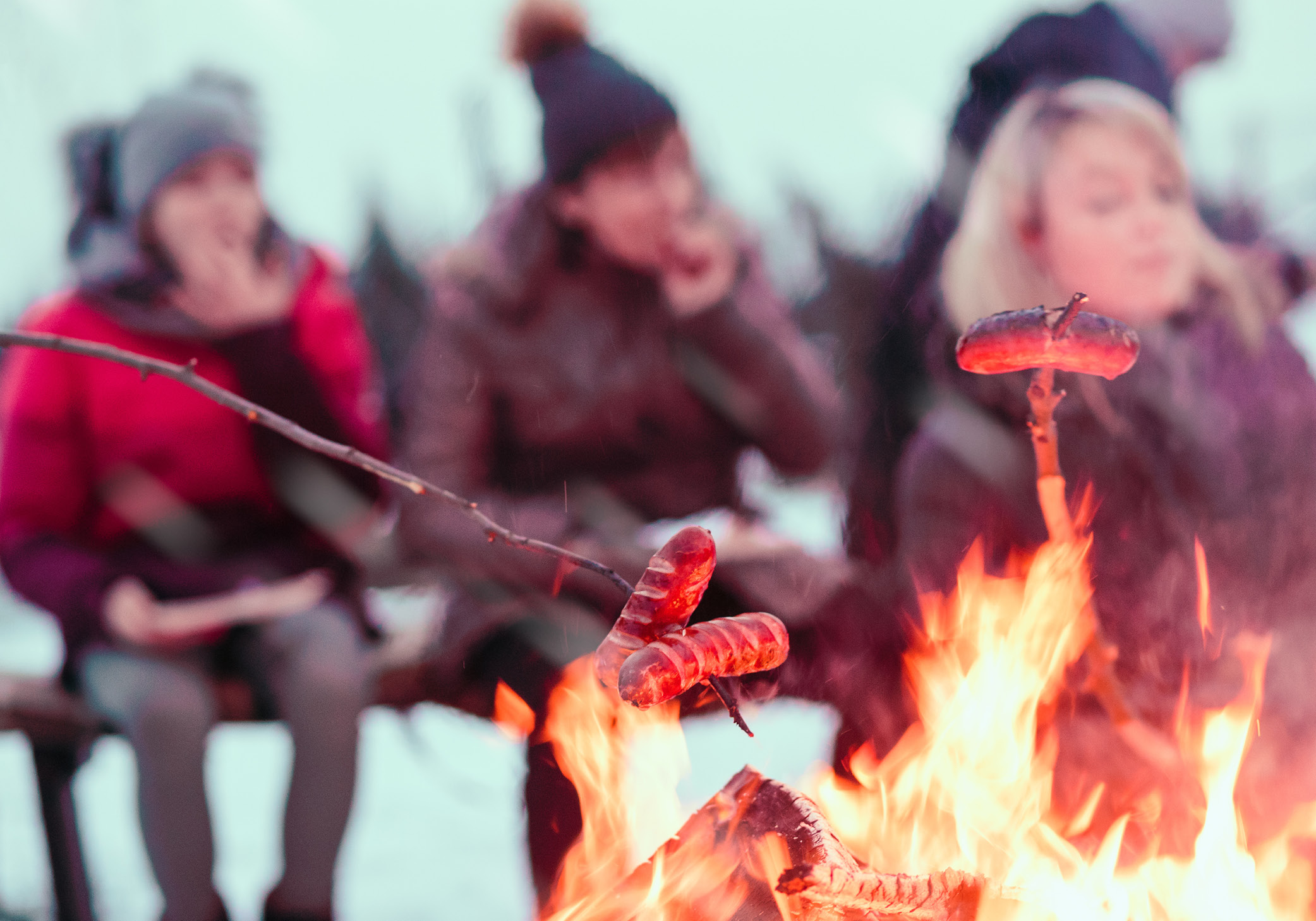 people around campfire