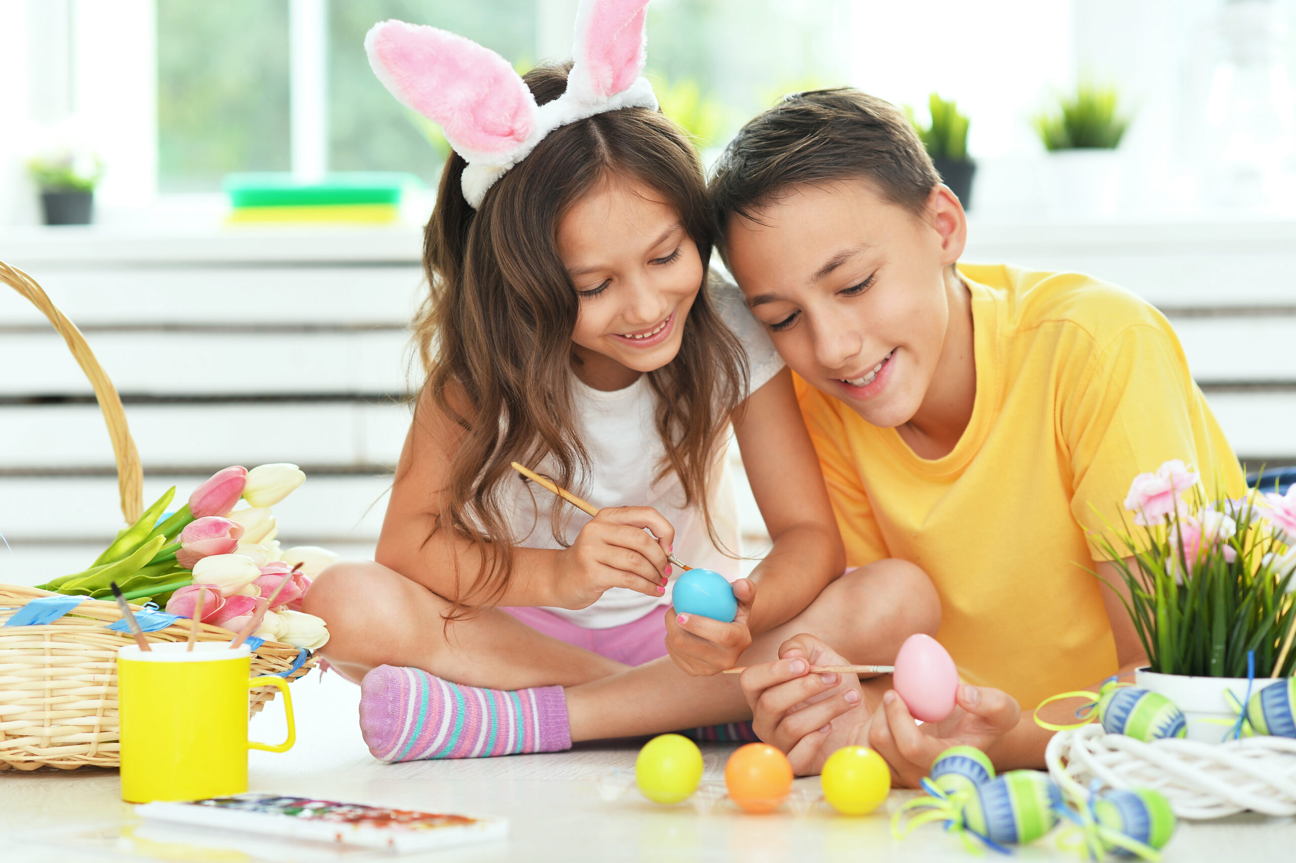 Siblings Painting Easter Eggs