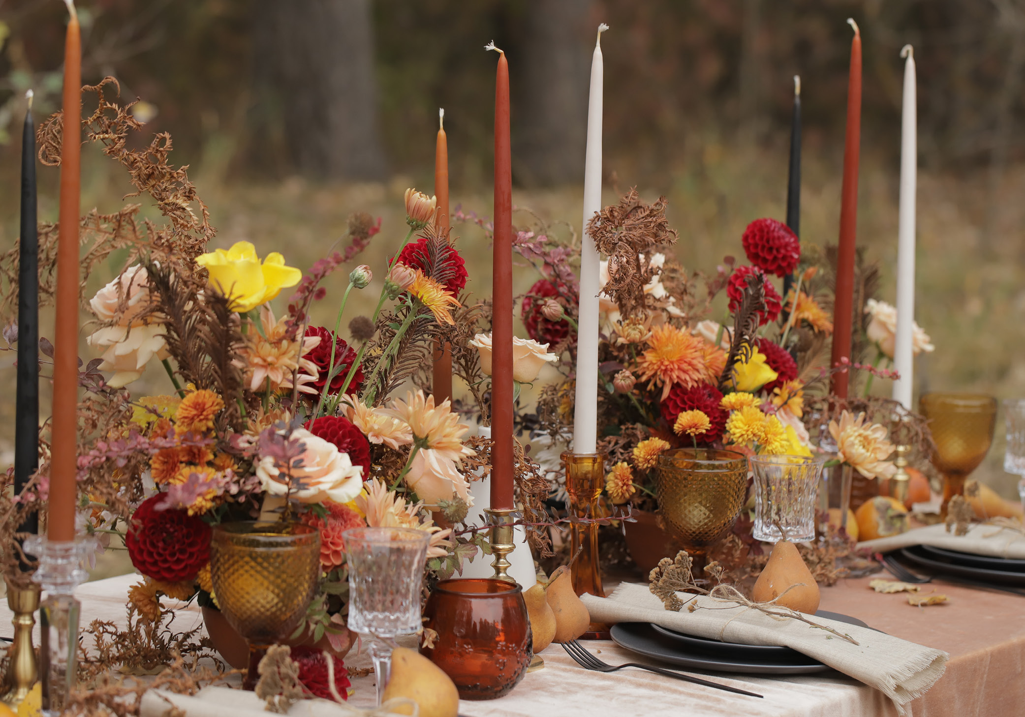 tall candles and flowers