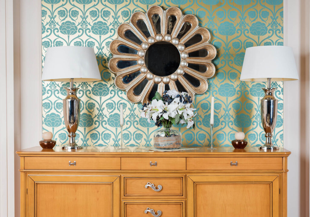 art deco style room with mirror and wallpaper