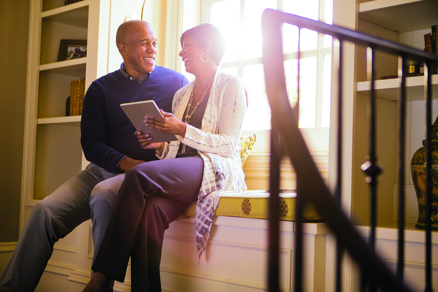 Couple looking at a tablet