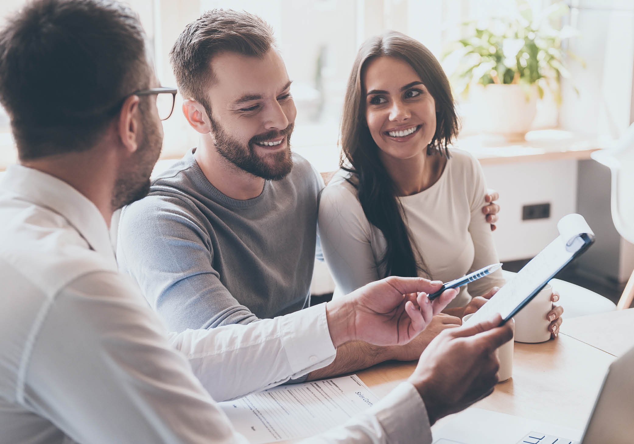 couple reviewing a checklist and smiling