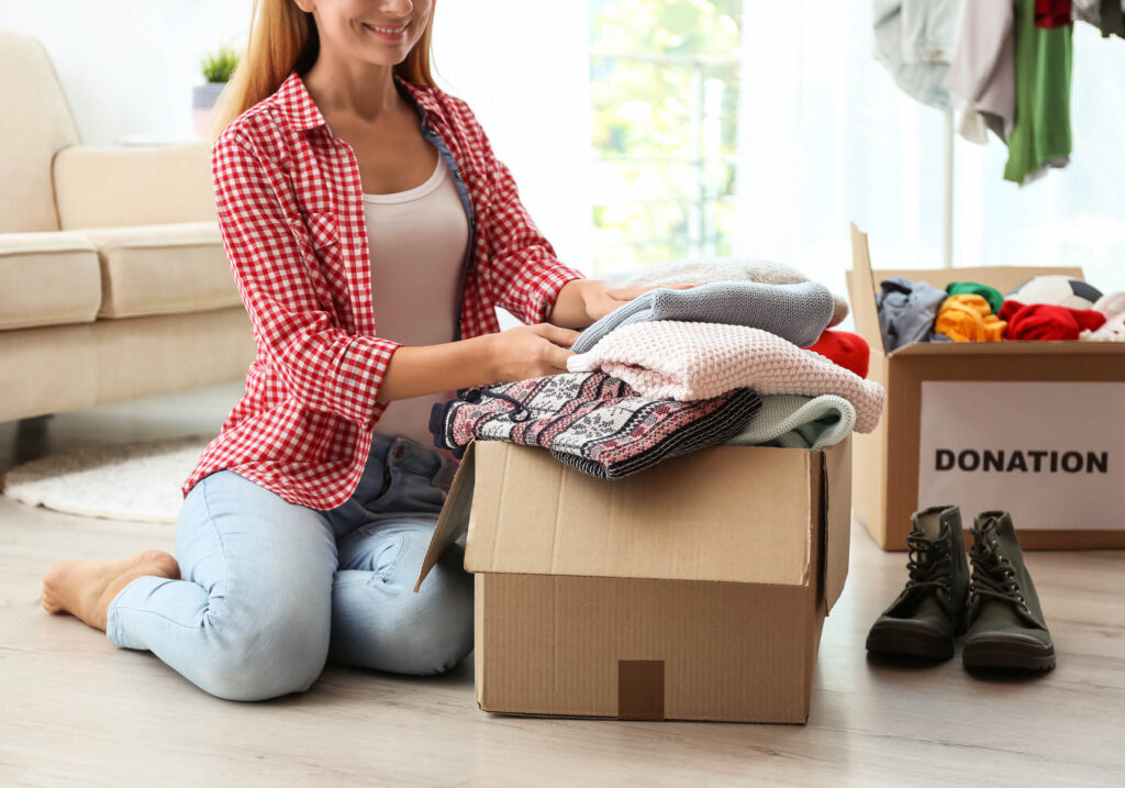 woman taking things out of a box